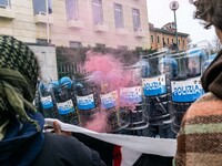 During a student march, a clash occurs in front of the Polytechnic University in Turin, Italy, on December 13, 2024. The students attempt to...