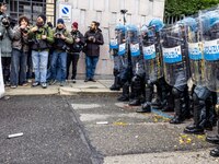 During a student march, a clash occurs in front of the Polytechnic University in Turin, Italy, on December 13, 2024. The students attempt to...