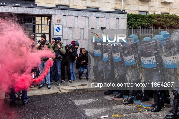 During a student march, a clash occurs in front of the Polytechnic University in Turin, Italy, on December 13, 2024. The students attempt to...