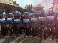 During a student march, a clash occurs in front of the Polytechnic University in Turin, Italy, on December 13, 2024. The students attempt to...