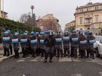 During a student march, a clash occurs in front of the Polytechnic University in Turin, Italy, on December 13, 2024. The students attempt to...