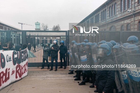 During a student march, a clash occurs in front of the Polytechnic University in Turin, Italy, on December 13, 2024. The students attempt to...