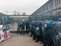 During a student march, a clash occurs in front of the Polytechnic University in Turin, Italy, on December 13, 2024. The students attempt to...