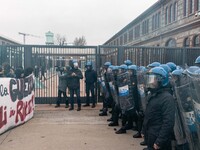 During a student march, a clash occurs in front of the Polytechnic University in Turin, Italy, on December 13, 2024. The students attempt to...