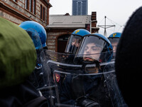 During a student march, a clash occurs in front of the Polytechnic University in Turin, Italy, on December 13, 2024. The students attempt to...