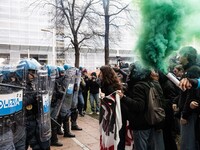 During a student march, a clash occurs in front of the Polytechnic University in Turin, Italy, on December 13, 2024. The students attempt to...