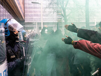 During a student march, a clash occurs in front of the Polytechnic University in Turin, Italy, on December 13, 2024. The students attempt to...