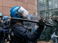 During a student march, a clash occurs in front of the Polytechnic University in Turin, Italy, on December 13, 2024. The students attempt to...