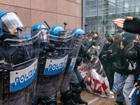 During a student march, a clash occurs in front of the Polytechnic University in Turin, Italy, on December 13, 2024. The students attempt to...