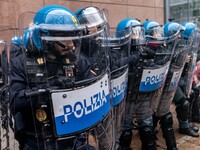 During a student march, a clash occurs in front of the Polytechnic University in Turin, Italy, on December 13, 2024. The students attempt to...