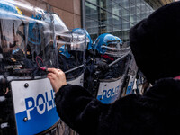 During a student march, a clash occurs in front of the Polytechnic University in Turin, Italy, on December 13, 2024. The students attempt to...