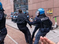 During a student march, a clash occurs in front of the Polytechnic University in Turin, Italy, on December 13, 2024. The students attempt to...