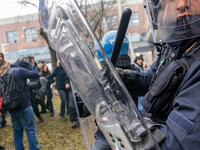 During a student march, a clash occurs in front of the Polytechnic University in Turin, Italy, on December 13, 2024. The students attempt to...