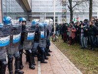 During a student march, a clash occurs in front of the Polytechnic University in Turin, Italy, on December 13, 2024. The students attempt to...