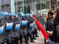 During a student march, a clash occurs in front of the Polytechnic University in Turin, Italy, on December 13, 2024. The students attempt to...