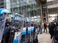 During a student march, a clash occurs in front of the Polytechnic University in Turin, Italy, on December 13, 2024. The students attempt to...