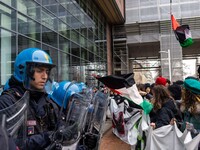 During a student march, a clash occurs in front of the Polytechnic University in Turin, Italy, on December 13, 2024. The students attempt to...