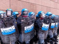 During a student march, a clash occurs in front of the Polytechnic University in Turin, Italy, on December 13, 2024. The students attempt to...