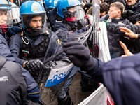 During a student march, a clash occurs in front of the Polytechnic University in Turin, Italy, on December 13, 2024. The students attempt to...