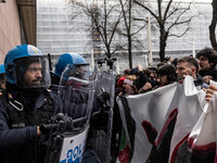 During a student march, a clash occurs in front of the Polytechnic University in Turin, Italy, on December 13, 2024. The students attempt to...