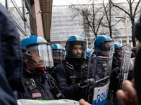 During a student march, a clash occurs in front of the Polytechnic University in Turin, Italy, on December 13, 2024. The students attempt to...