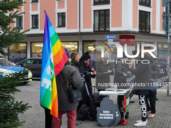 Women in Black hold a vigil at Gartnerplatz in Munich, Bavaria, Germany, on December 13, 2024, advocating for justice and peace in the Middl...