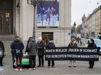 Women in Black hold a vigil at Gartnerplatz in Munich, Bavaria, Germany, on December 13, 2024, advocating for justice and peace in the Middl...