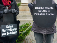 Women in Black hold a vigil at Gartnerplatz in Munich, Bavaria, Germany, on December 13, 2024, advocating for justice and peace in the Middl...