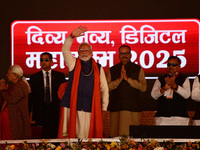 Indian Prime Minister Narendra Modi gestures during a public meeting ahead of the Maha Kumbh Mela festival along the banks of Sangam, the co...