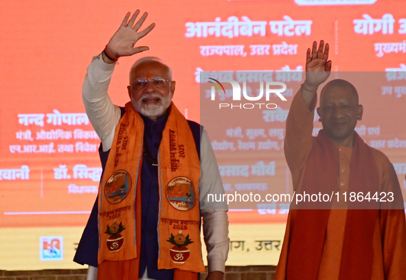 Indian Prime Minister Narendra Modi and Uttar Pradesh Chief Minister Yogi Adityanath attend the inauguration of various development projects...