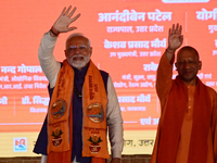 Indian Prime Minister Narendra Modi and Uttar Pradesh Chief Minister Yogi Adityanath attend the inauguration of various development projects...