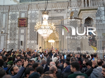 Syrians Perform The First Friday Prayer At The Umayyad Mosque In The Capital, Damascus, After The Fall Of The Assad Regime, on december 13,...