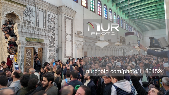 Syrians Perform The First Friday Prayer At The Umayyad Mosque In The Capital, Damascus, After The Fall Of The Assad Regime, on december 13,...