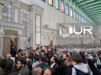 Syrians Perform The First Friday Prayer At The Umayyad Mosque In The Capital, Damascus, After The Fall Of The Assad Regime, on december 13,...