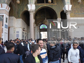 Syrians Perform The First Friday Prayer At The Umayyad Mosque In The Capital, Damascus, After The Fall Of The Assad Regime, on december 13,...