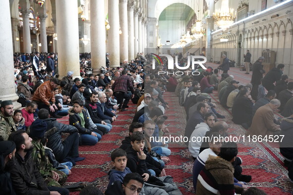 Syrians Perform The First Friday Prayer At The Umayyad Mosque In The Capital, Damascus, After The Fall Of The Assad Regime, on december 13,...