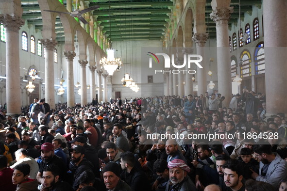 Syrians Perform The First Friday Prayer At The Umayyad Mosque In The Capital, Damascus, After The Fall Of The Assad Regime, on december 13,...