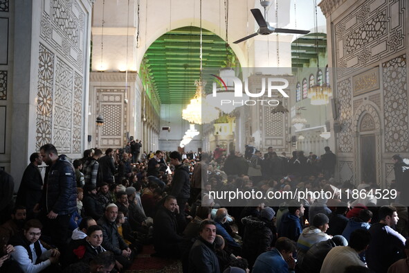 Syrians Perform The First Friday Prayer At The Umayyad Mosque In The Capital, Damascus, After The Fall Of The Assad Regime, on december 13,...