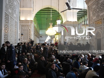 Syrians Perform The First Friday Prayer At The Umayyad Mosque In The Capital, Damascus, After The Fall Of The Assad Regime, on december 13,...