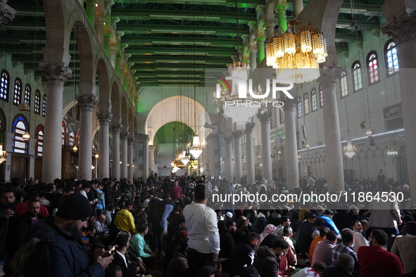 Syrians Perform The First Friday Prayer At The Umayyad Mosque In The Capital, Damascus, After The Fall Of The Assad Regime, on december 13,...