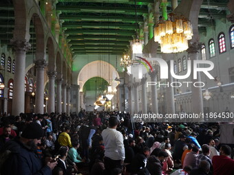 Syrians Perform The First Friday Prayer At The Umayyad Mosque In The Capital, Damascus, After The Fall Of The Assad Regime, on december 13,...