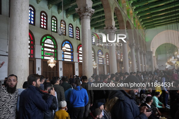 Syrians Perform The First Friday Prayer At The Umayyad Mosque In The Capital, Damascus, After The Fall Of The Assad Regime, on december 13,...