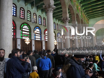 Syrians Perform The First Friday Prayer At The Umayyad Mosque In The Capital, Damascus, After The Fall Of The Assad Regime, on december 13,...