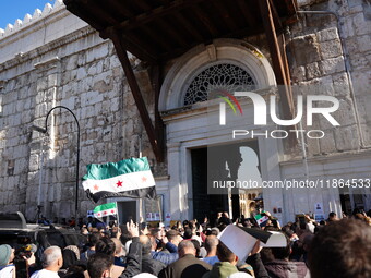 Syrians Perform The First Friday Prayer At The Umayyad Mosque In The Capital, Damascus, After The Fall Of The Assad Regime, on december 13,...