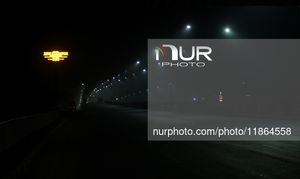 Street Lights Are Seen In The Fog Weather As Cold Waves Continues In The Eastern Parts Of India And Maximum Homeless People Are Facing Their...