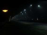 Street Lights Are Seen In The Fog Weather As Cold Waves Continues In The Eastern Parts Of India And Maximum Homeless People Are Facing Their...