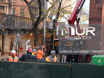 One construction worker dies and one construction worker is injured in a construction accident in Manhattan, New York, United States, on Dec...