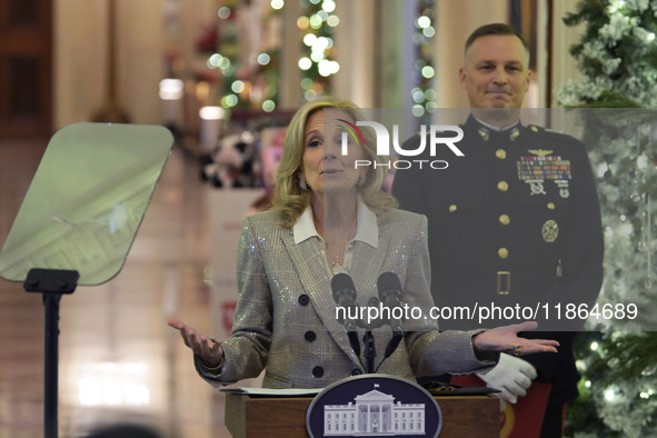 The First Lady Jill Biden holds a U.S. Marine Corps Reserve Toys for Tots event with local Marine Corps families in the East Room of the Whi...