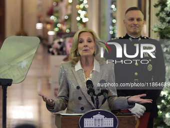 The First Lady Jill Biden holds a U.S. Marine Corps Reserve Toys for Tots event with local Marine Corps families in the East Room of the Whi...