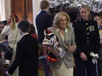 The First Lady Jill Biden holds a U.S. Marine Corps Reserve Toys for Tots event with local Marine Corps families in the East Room of the Whi...